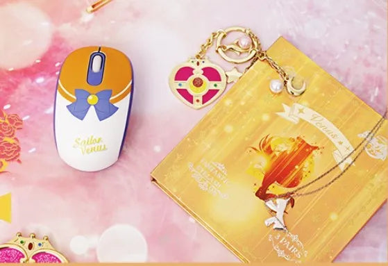 Pink Sailor Moon wireless office mouse with USB receiver showing cartoon design and compact 100mm size