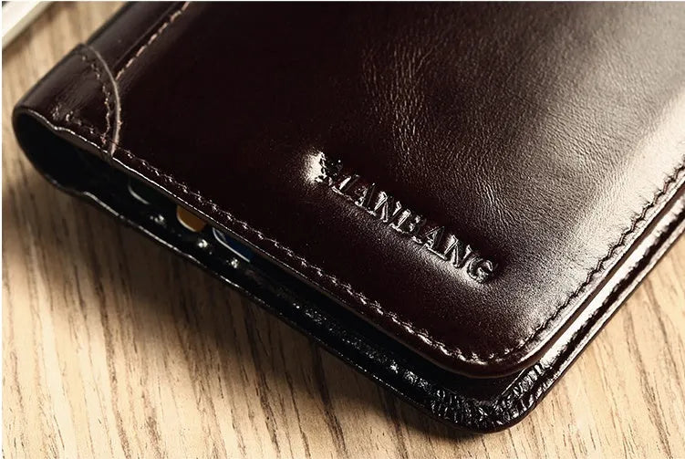 Men's black leather wallet open showing internal card slots, note compartment, and change section.