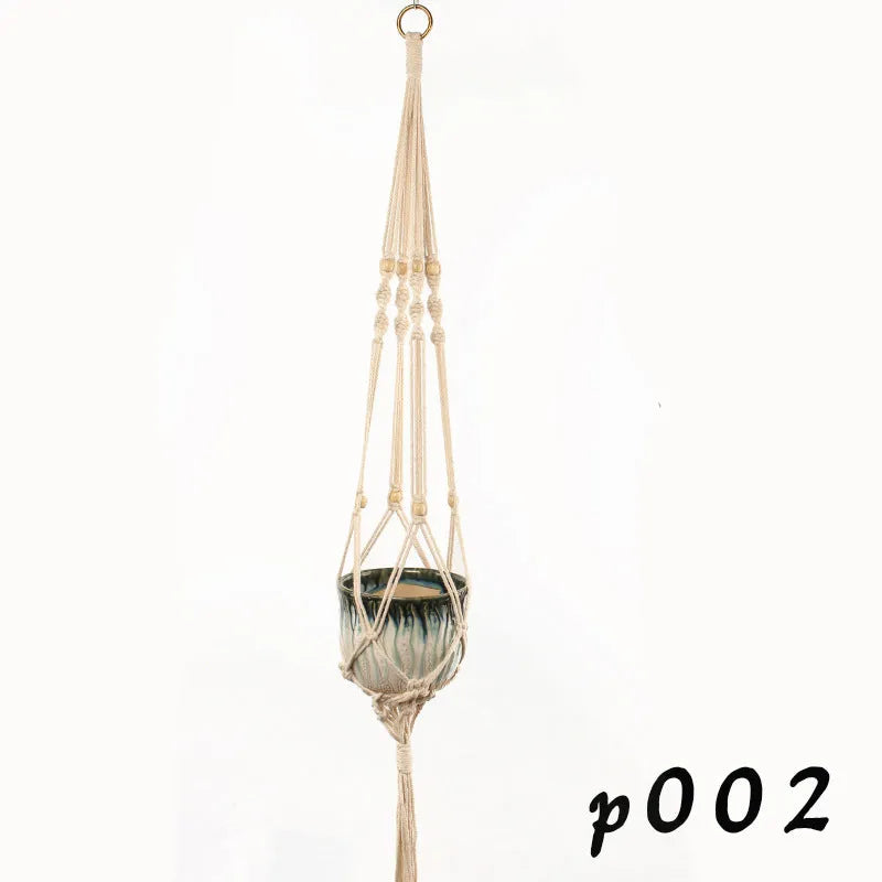 Woven cotton rope wire basket plant pot holder in a wall hanging style.