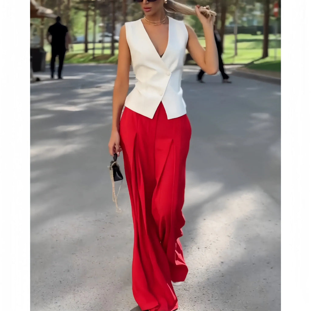 Women's beige two-piece set with deep V-neck sleeveless top and wide leg trousers