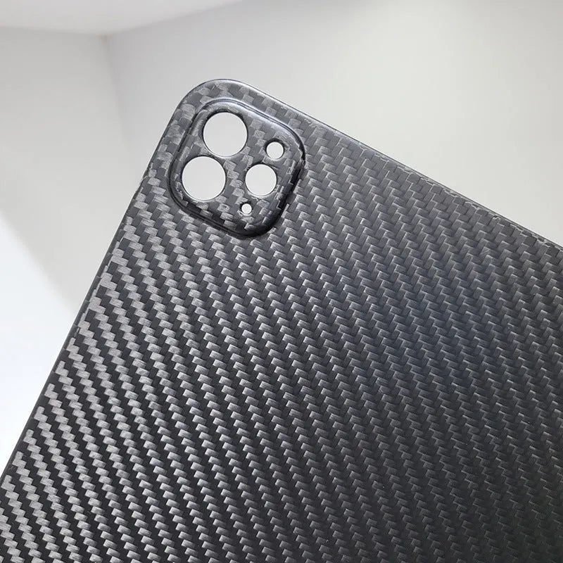 Genuine carbon fibre flat protective cover for Apple iPad Pro 11 with embossed plaid pattern.