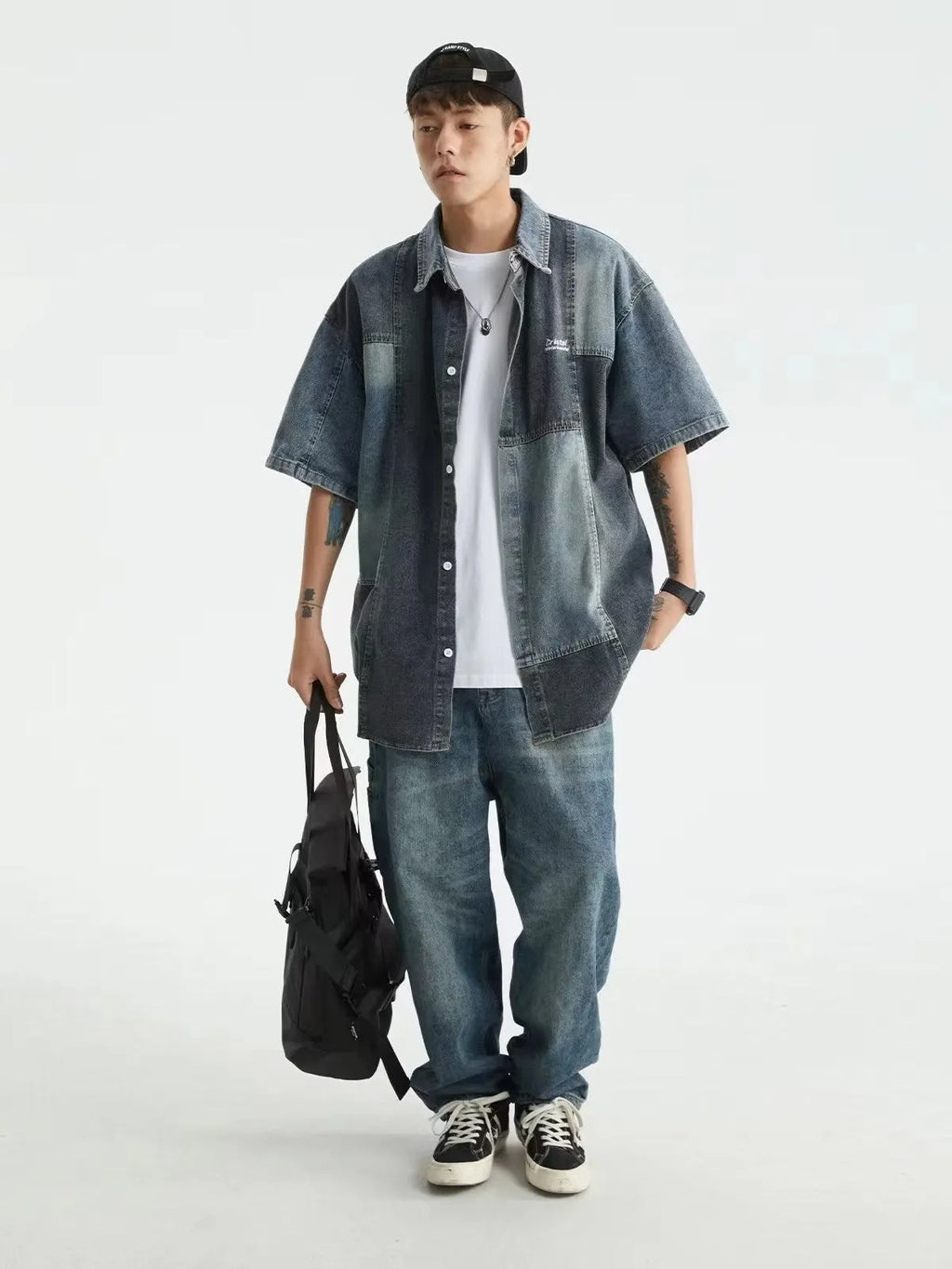 Men's blue Japanese-style retro washed denim shirt with loose cardigan fit and classic stitching detail