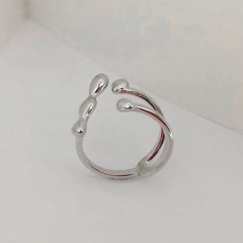 Brass women's ring with spherical design in gold and silver colour options