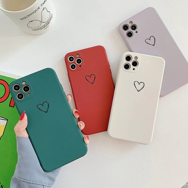 Solid colour silicone TPU phone case for Apple iPhone on a table.