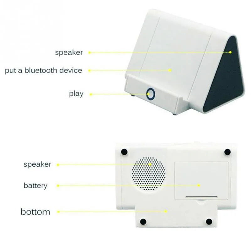 Black and white wireless mini Bluetooth speaker with built-in USB cable for mobile phones and laptops