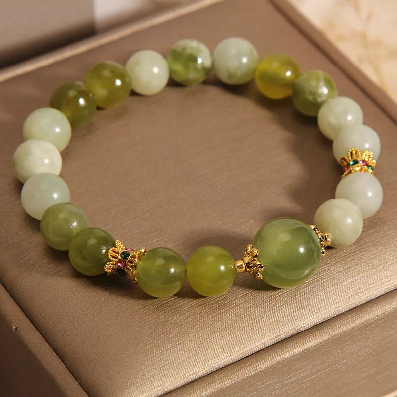 Women's genuine jade bracelet in Xiuyan jade green colour, mori-inspired original design.