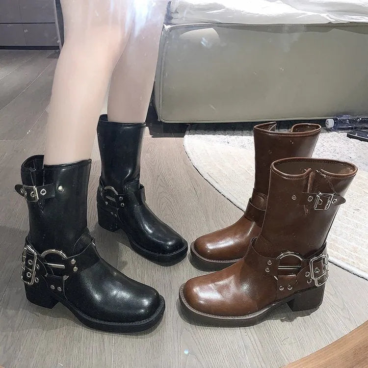 Women's black platform fashion boots with buckle detail and mid-calf length