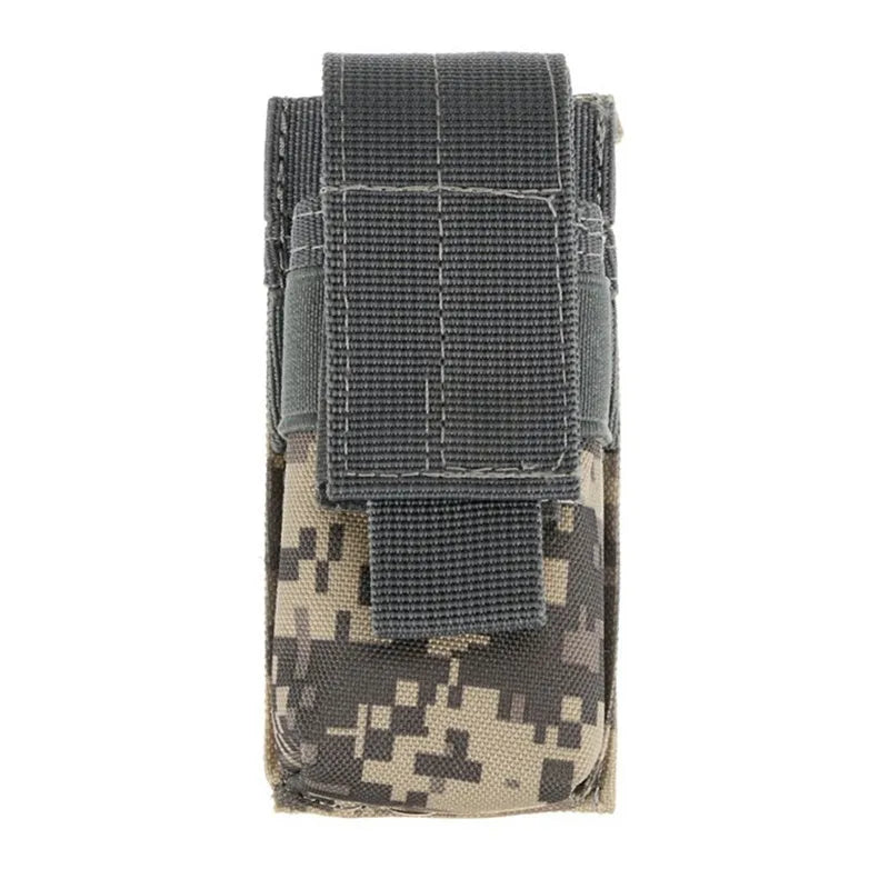 Black 600D nylon MOLLE tactical pouch with elastic cord closure, shown next to a small flashlight for scale.