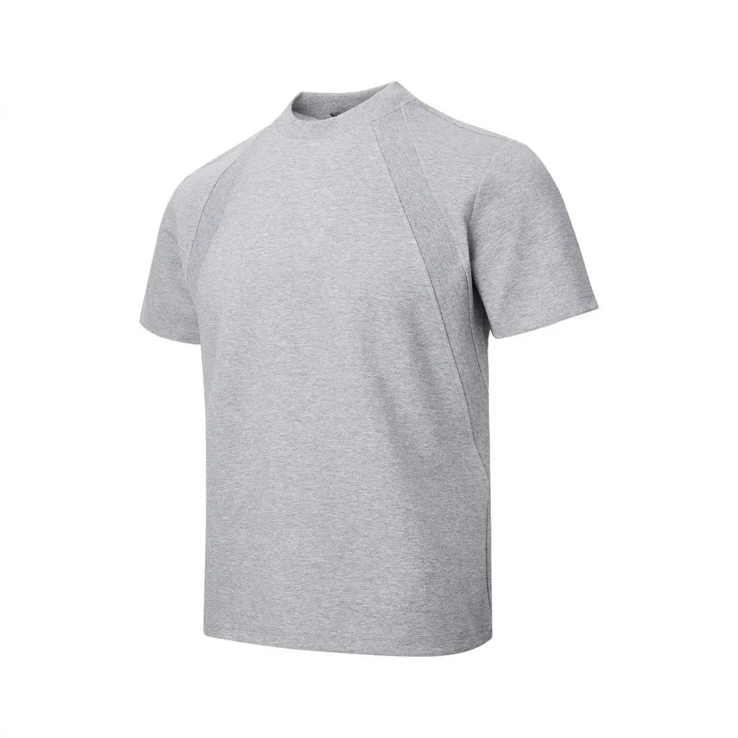 Loose-fit short sleeve top with textured air layer stitching in black.