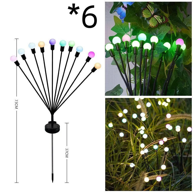 Solar-powered LED firefly ground lights with stainless steel stake for garden installation
