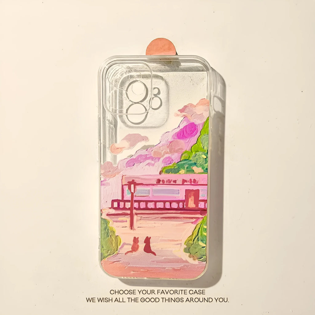 Soft silicone iPhone case with a colourful cartoon graphic of two cats on the back.