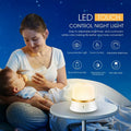 White cylindrical bedside night light with touch controls for dimming and colour changing