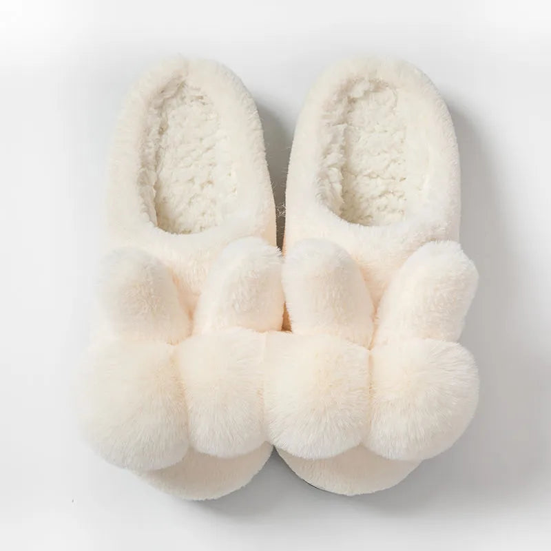 Women's high upper fluffy bunny slippers in rabbit fur, shown in creamy white colour with a low heel.