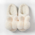 Women's high upper fluffy bunny slippers in rabbit fur, shown in creamy white colour with a low heel.