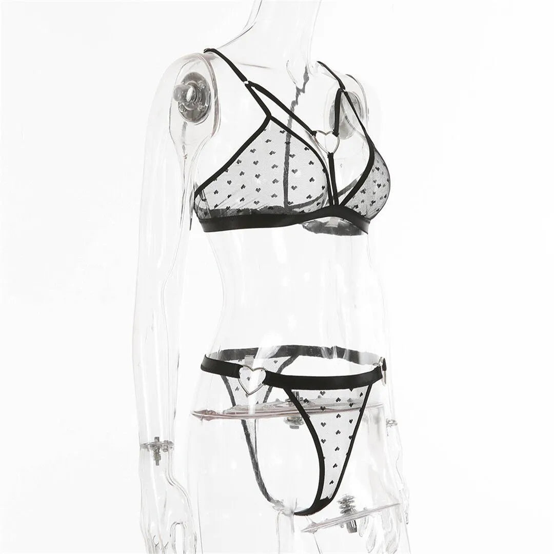 Women's black mesh two-piece set with separate top and pants in stretch spandex fabric
