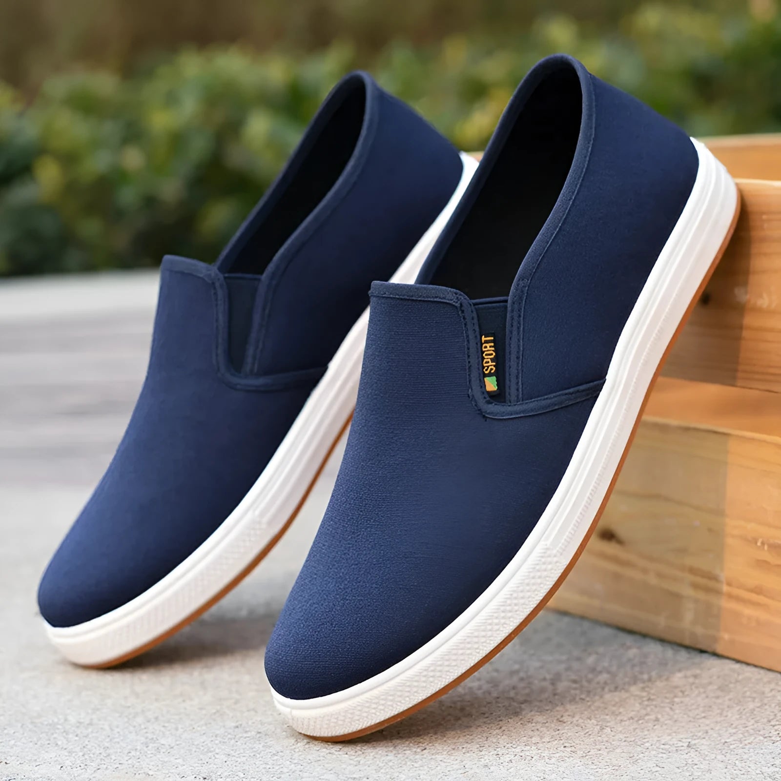 Men's black and blue canvas slip-on shoes with round toe and composite sole