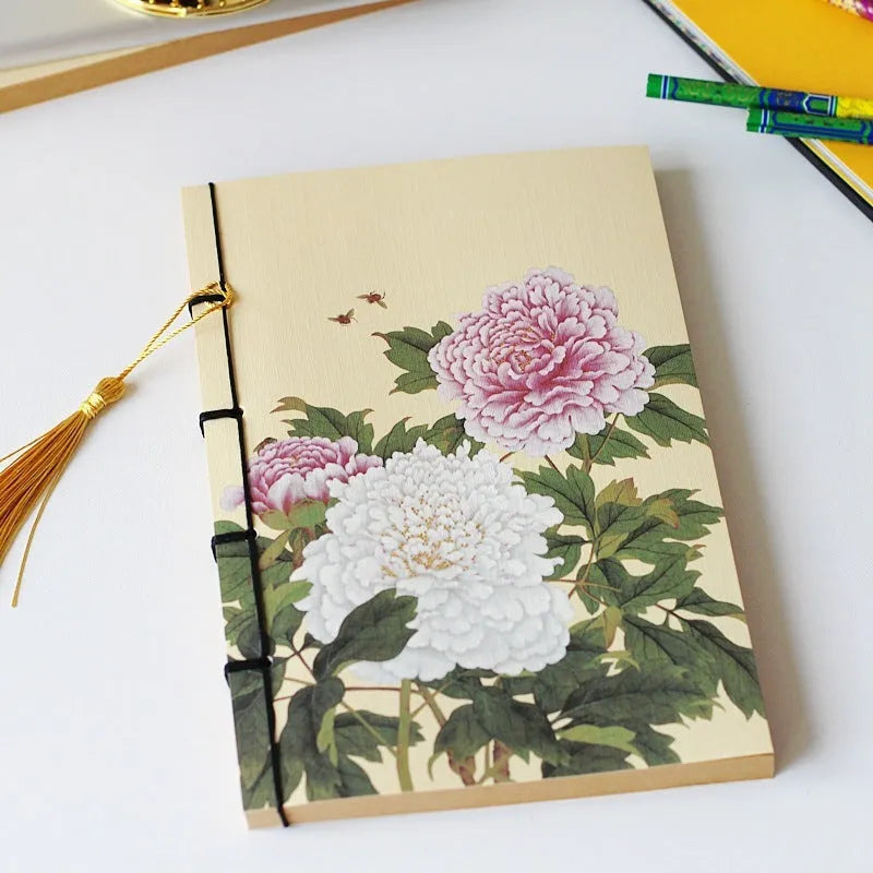 Retro antique wire-bound ledger notebook with embossed cowhide cover and decorative tassels
