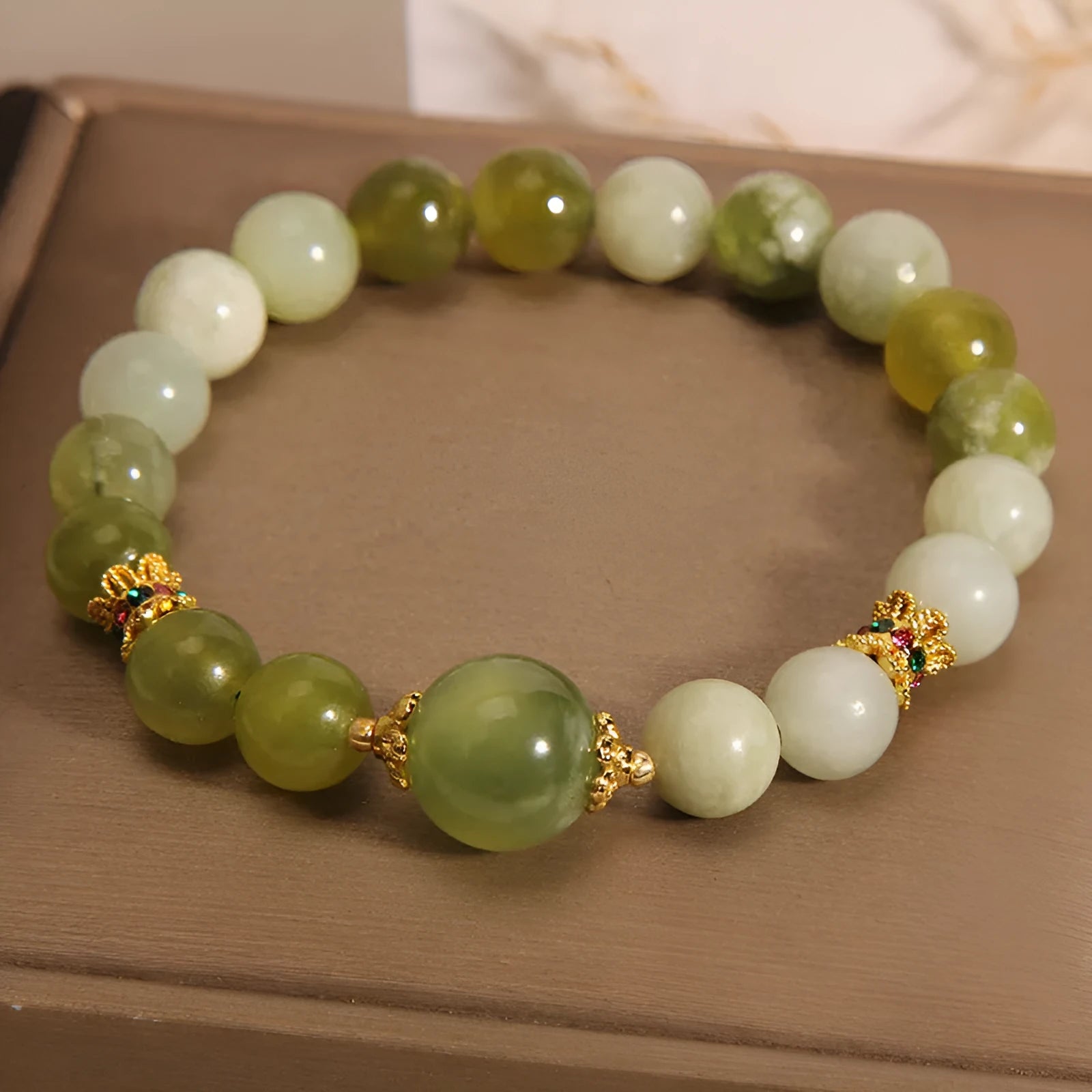 Women's genuine jade bracelet in Xiuyan jade green colour, mori-inspired original design.