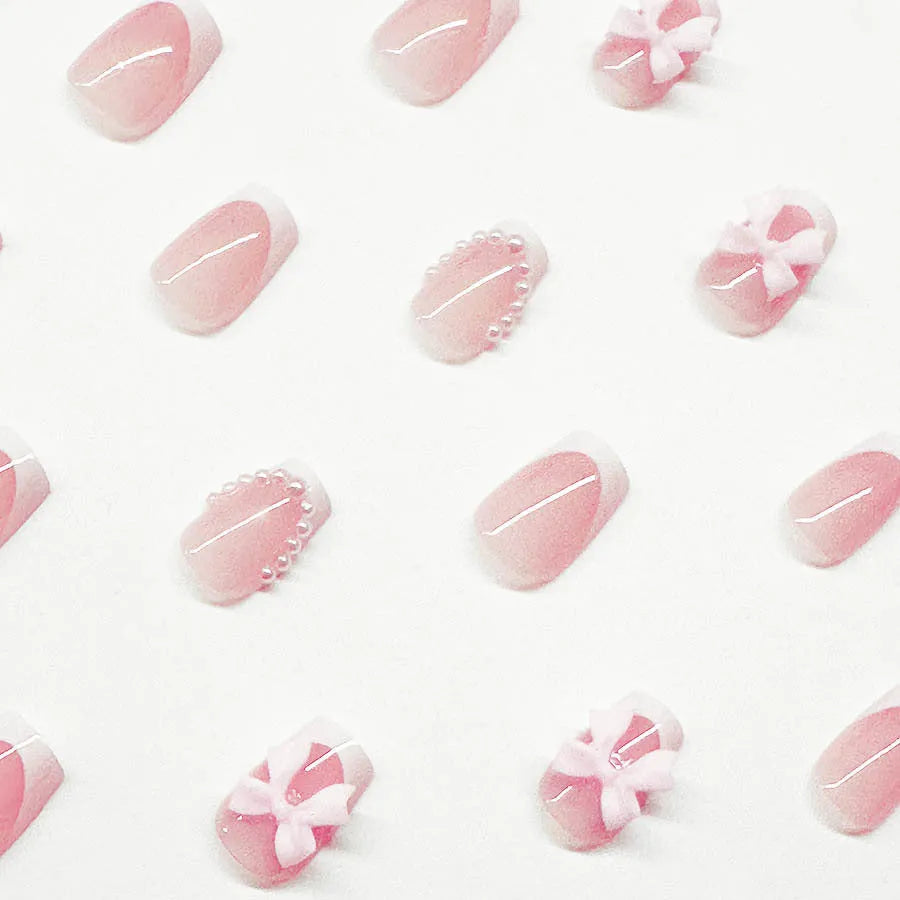 Nail art set with S274 glue showing French designs, bows, and leopard patterns for short square nails