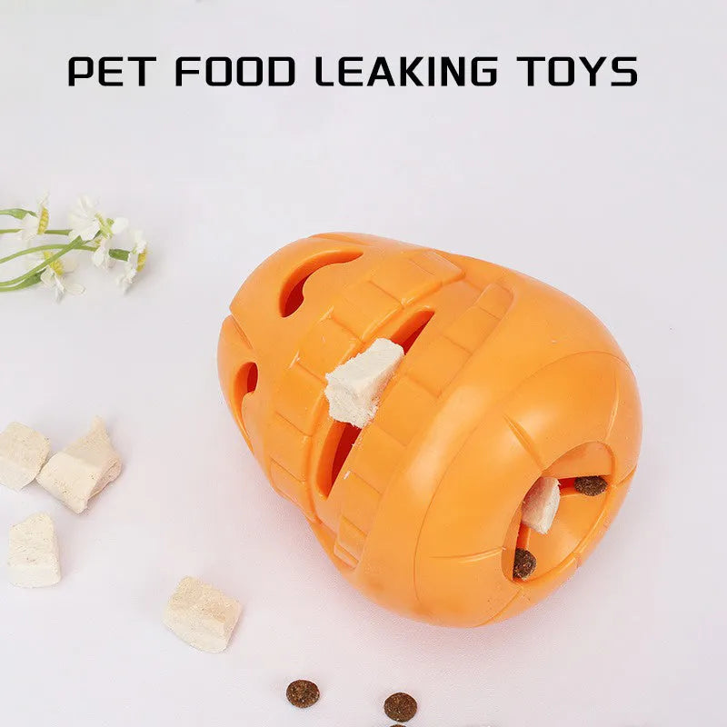 Orange Halloween pumpkin shaped dog chew toy with a treat-dispensing funnel hole.