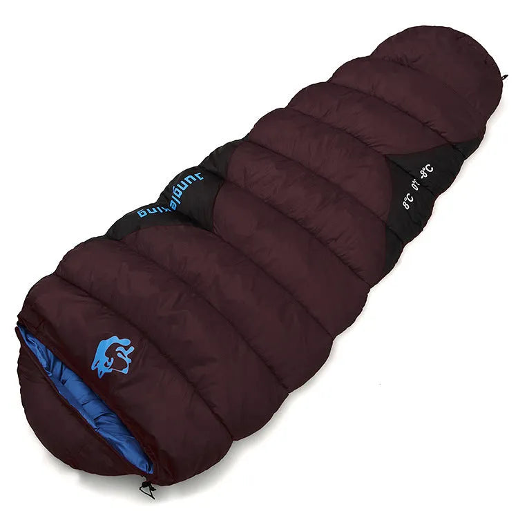 Cotton-filled camping sleeping bag in army green with its grey compression storage bag.