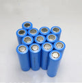 Single grey 18650 lithium-ion battery cell with 3.7V 2600mAh label on white background