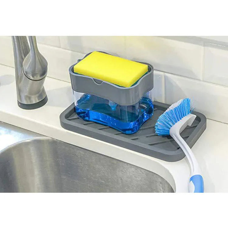 Plastic kitchen soap dispenser in silver with pump top on countertop