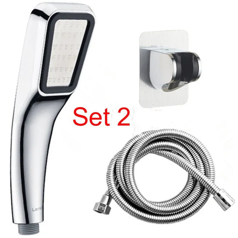 Orange hand-held pressurised shower set with rain function and multiple shower head options