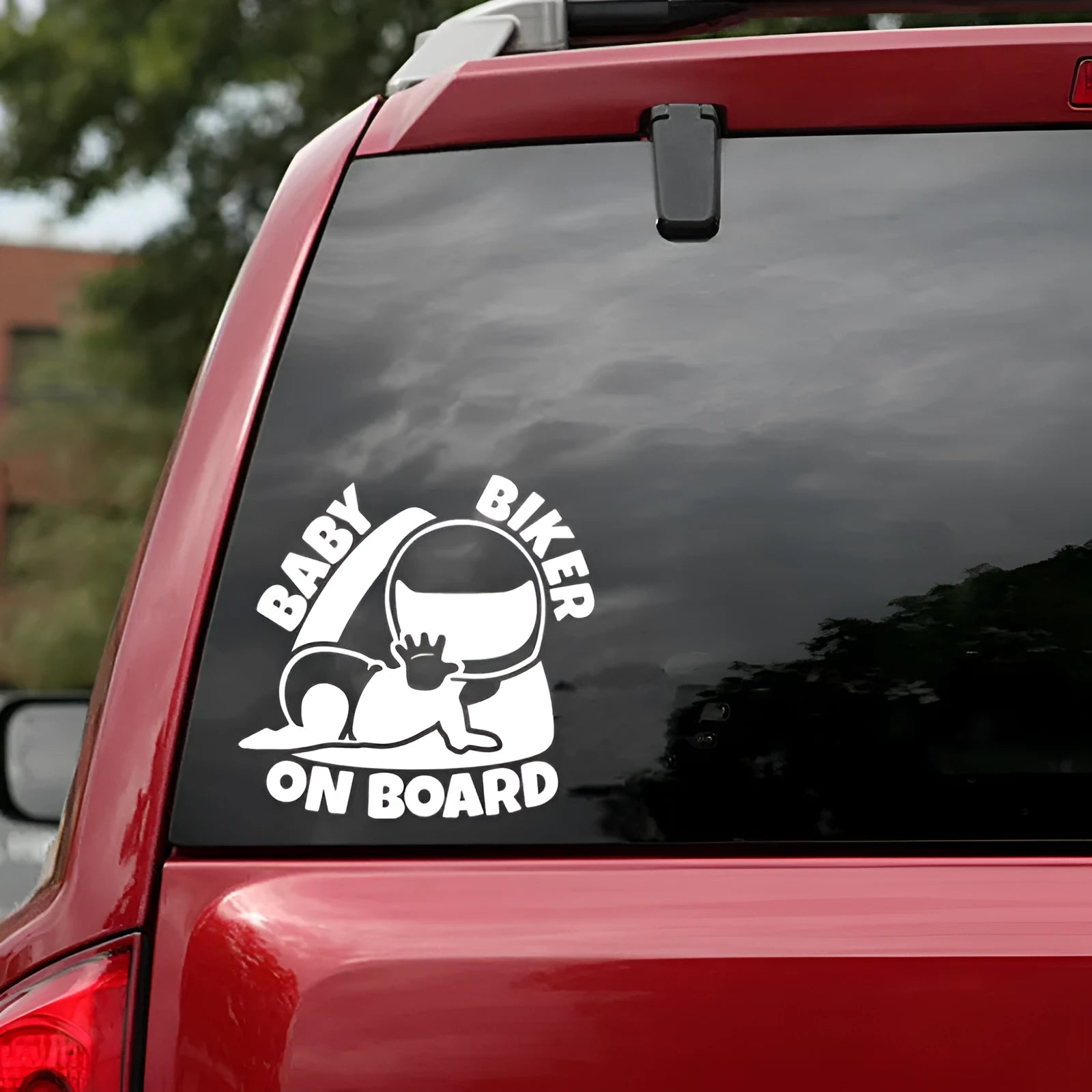 Black and white reflective Baby On Board warning sticker for car window measuring 14.5 by 15 cm.