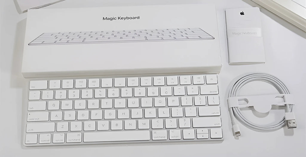 White Apple Bluetooth keyboard with ultra-thin metal design and multimedia function keys