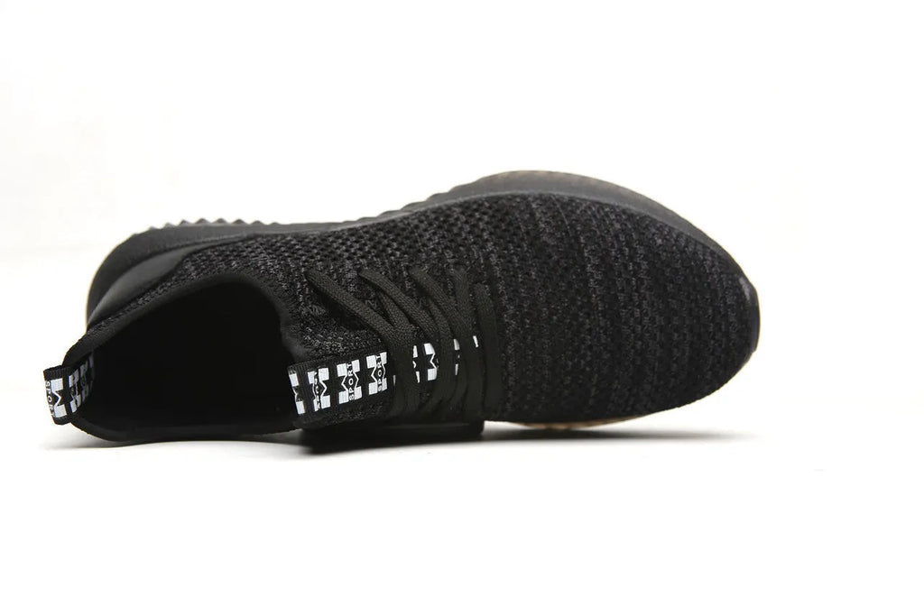 Men's low-top steel toe cap safety shoes in black with anti-static EVA sole for work and climbing.