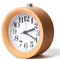 Solid beech wood silent alarm clock with 4-inch diameter display on wooden surface