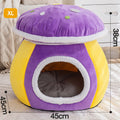 Purple mushroom-shaped plush cat nest with a detachable blanket, shown on a wooden floor.