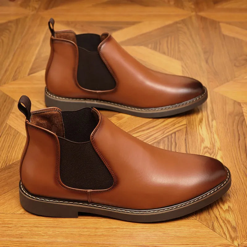 Black and brown formal pointed-toe leather boots with a square heel and rubber sole.