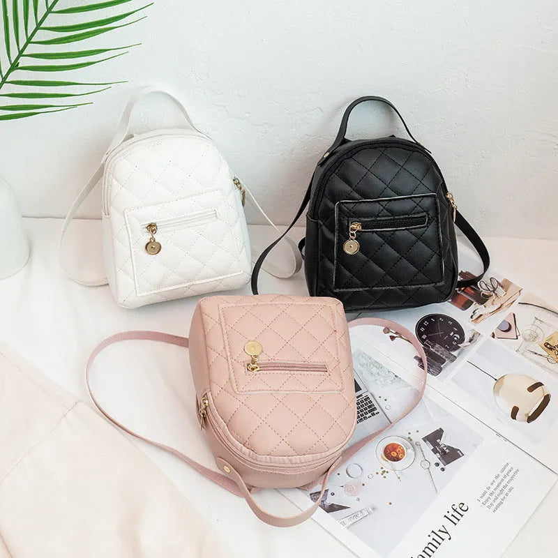 Girls' hard case square backpack with embroidery in white, black, or pink colours, showing soft handle and dimensions.