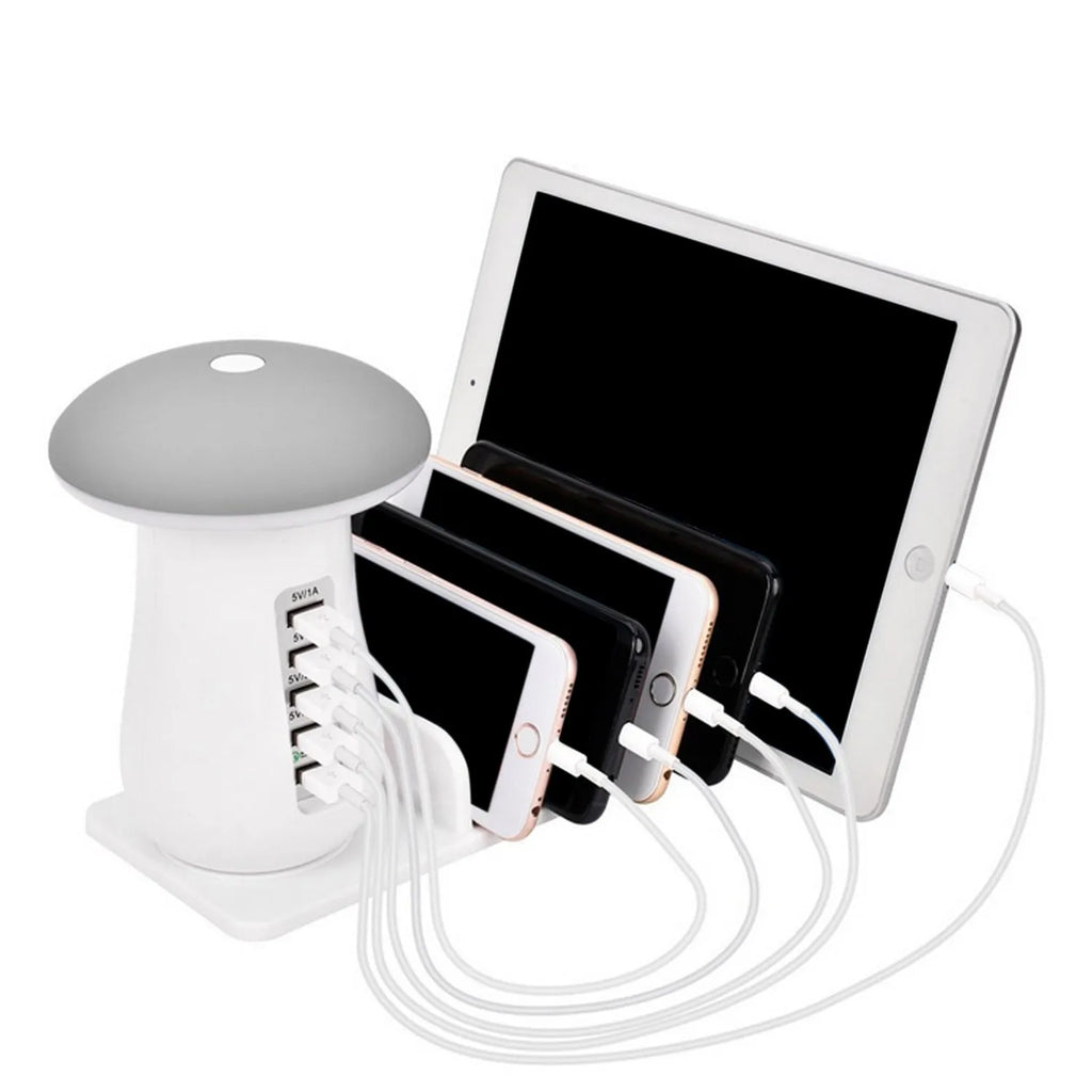 White mushroom-shaped LED desk lamp with 5 USB charging ports on a wooden desk