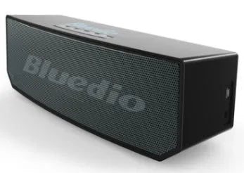 BS-6 black compact rectangular Bluetooth smart speaker on a surface.