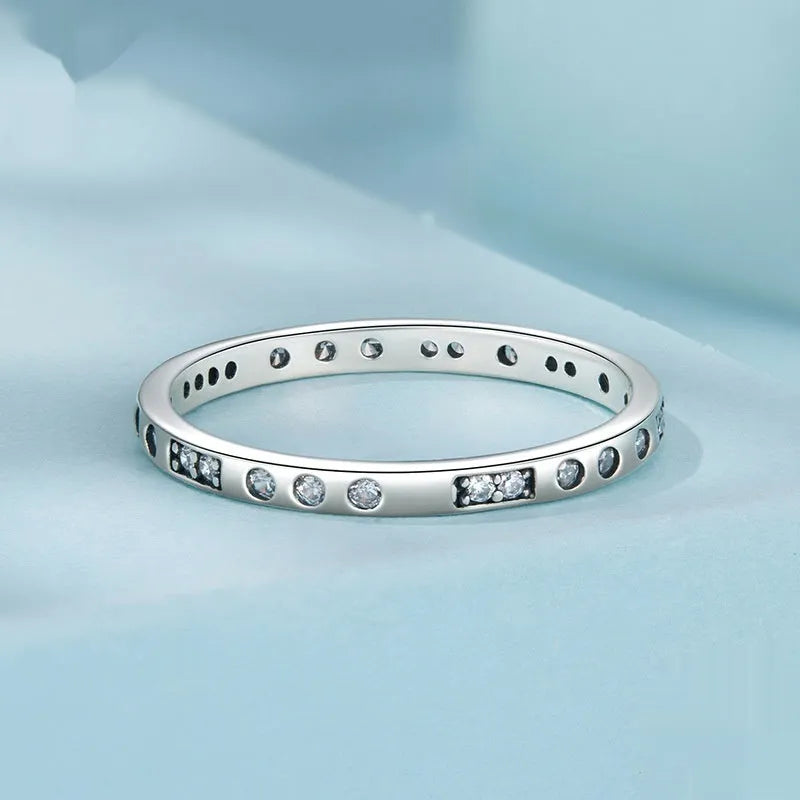 Silver Moss Password I Love You ring with oxidised black finish on a simple band.