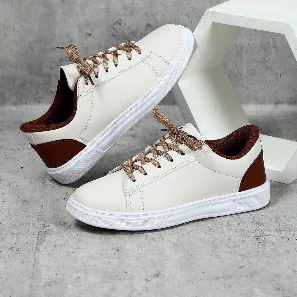 Beige brown platform skateboard sneakers with cross belt design and rubber sole