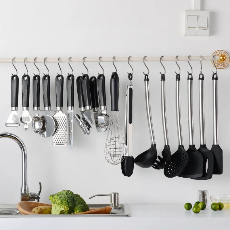 Black silicone and stainless steel kitchen utensil set with 16 pieces for cooking and baking