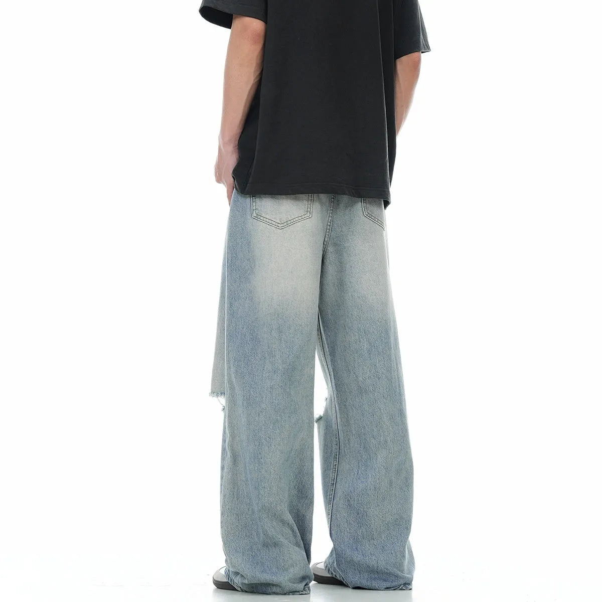 Blue straight-leg men's jeans with a zip fly, shown laid flat.