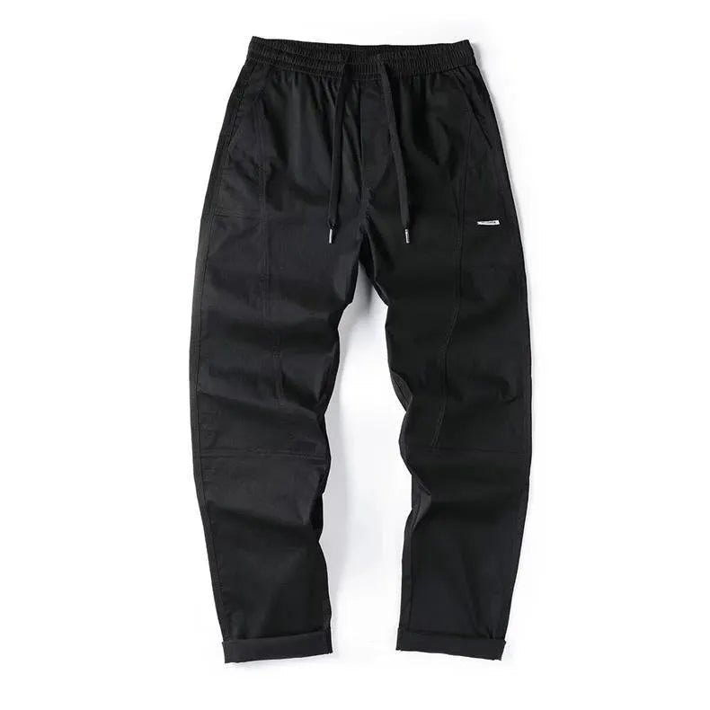 Cotton wide-leg trousers in milky white and black colours with loose fit design