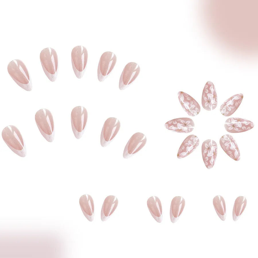 Short glossy almond false nails with French style and glitter powder flower design