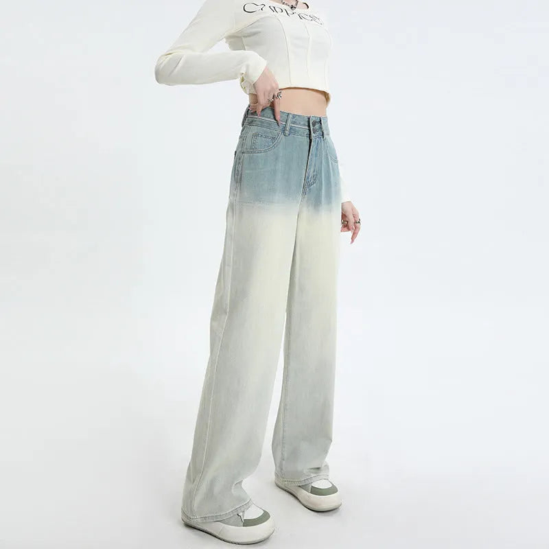 Women's gradient blue denim straight-leg trousers with wide-leg styling on size chart background