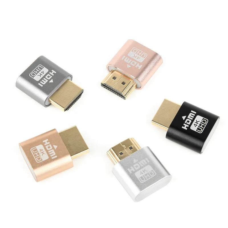 Compact HDMI graphics card dummy plug in gold, silver, black, gray, or rose gold finish for virtual display emulation.