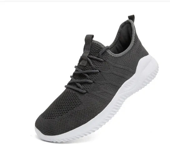 Men's black and white breathable mesh sneakers with lace-up closure and PVC sole