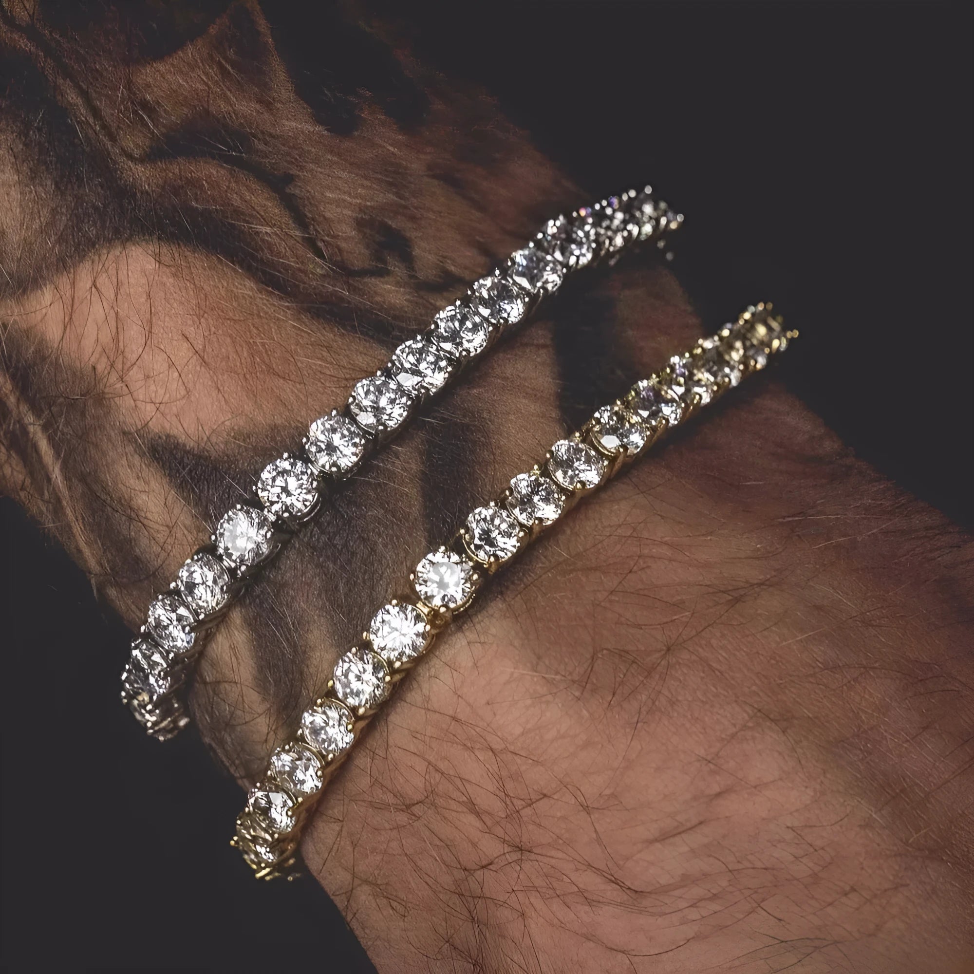 Men's silver geometric chain bracelet with a single row of clear rhinestones on a black background.