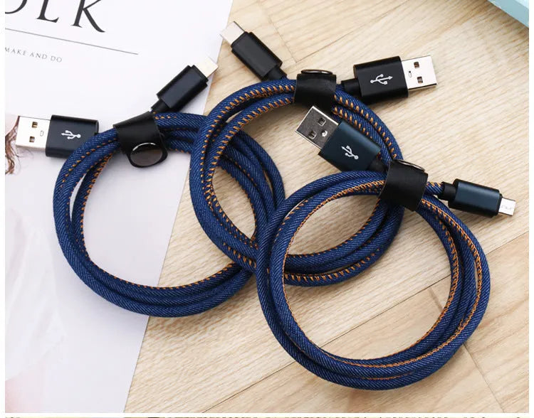 Cowboy-style denim USB Type-C charging cable with aluminium connectors in black, blue, and red colour options