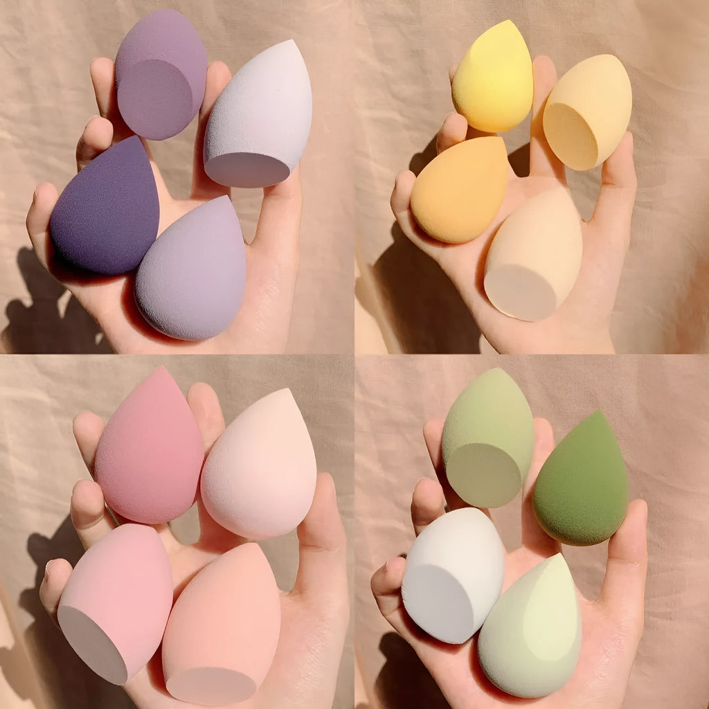 Four 6cm makeup egg sponges in grape, mango, mint and peach colours