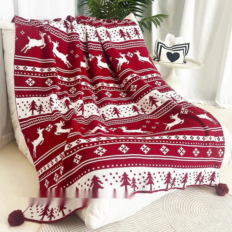 Christmas blanket with snowflake and reindeer patterns in acrylic material